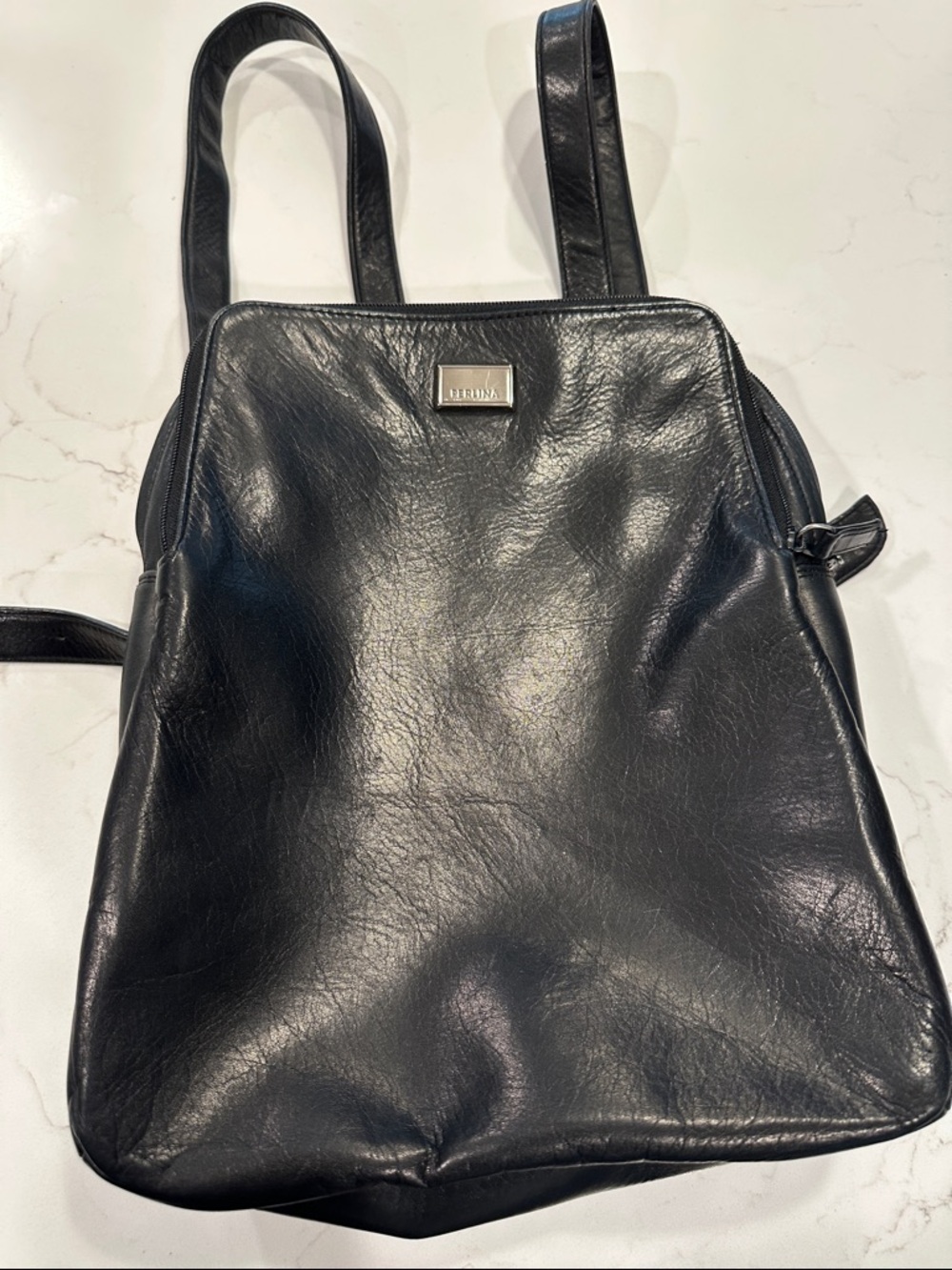 Perlina Black Leather Backpack with Metal Logo Plaque